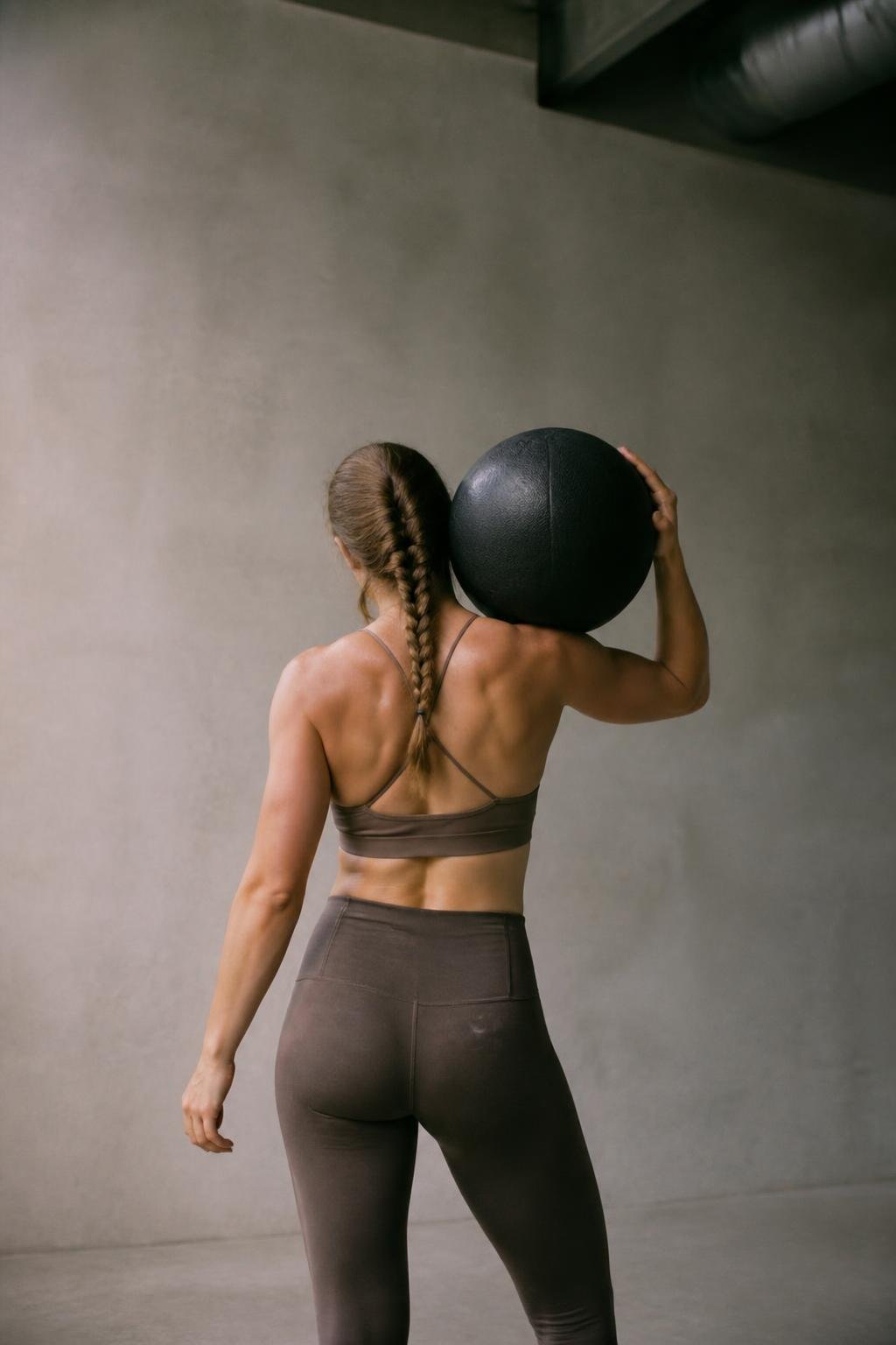 Woman with medicine ball